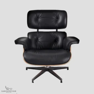 Full set view of a walnut and black leather Eames lounge chair knock off in a studio setting.