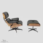 A high-quality Charles Ray Eames lounge chair replica with black leather and ash wood grain.