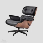 Close-up of the tufted black leather upholstery on an Eames lounge chair knock off by Eman Fatima.