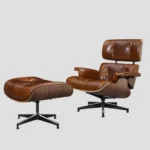 Side angled view of the tall XL eames lounge chair replica in waxed vintage tan leather.