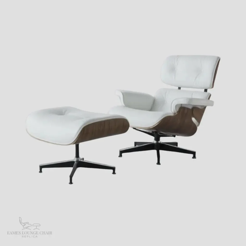 Complete set of white leather eames armchair replica and matching ottoman by Eman Fatima.
