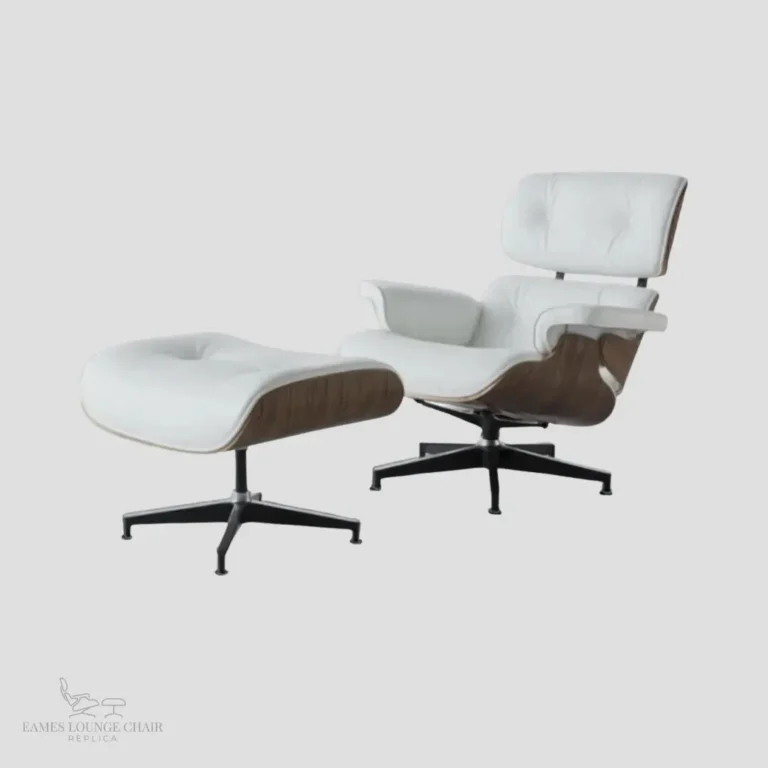 Complete set of white leather eames armchair replica and matching ottoman by Eman Fatima.