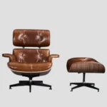 Front view of the extra-large eames lounge chair replica with waxed vintage tan cushions.
