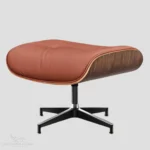 Detailed side view of the tan brown walnut wood ottoman for an Eames lounge chair reproduction.